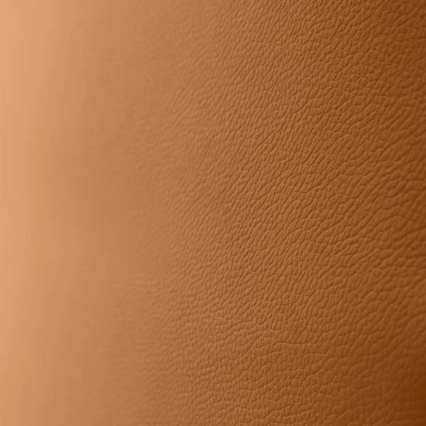 Die Textur des Echtleders in calvados am Chefsessel agilis matrix tritt deutlich hervor.