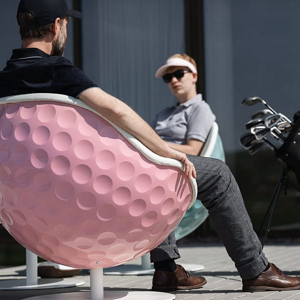 image of a lillus by lento golf chair in eagle style coloured ball seat round chair golf sports furniture highend ball stool for hotels or sports management