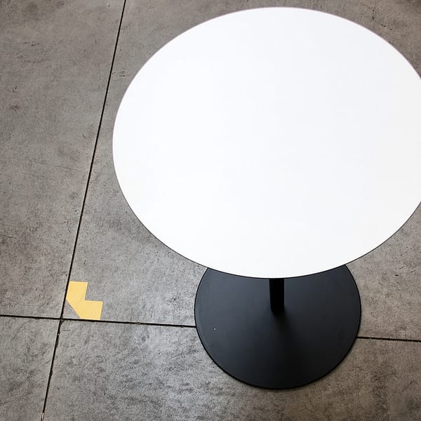 image of a lillus by lento bar table dining table in black and white colour stainless steel german sports furniture unique lounge chair for sports industry gastronomy hotel area
