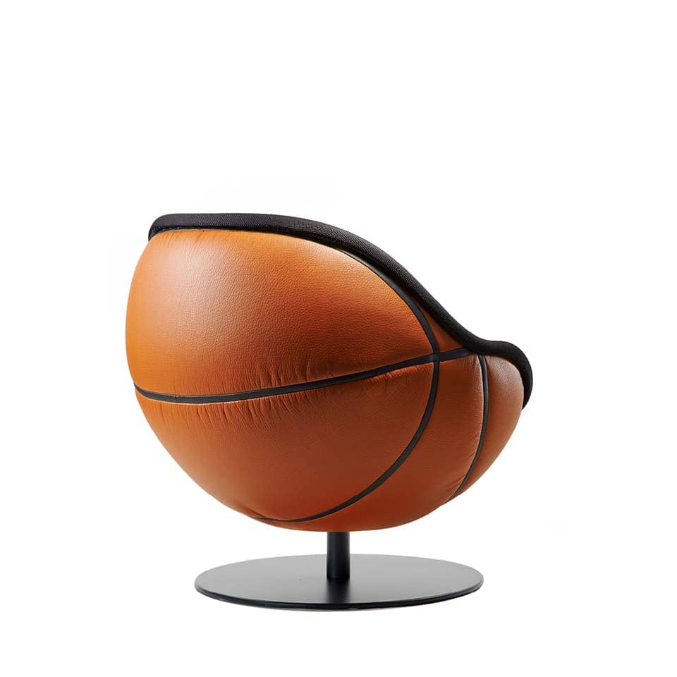 image of a lounge chair basketball chair ball chair round chair bowl chair globe chair in orange and black colour unique sports furniture made in germany for gastronomy sports management retail design