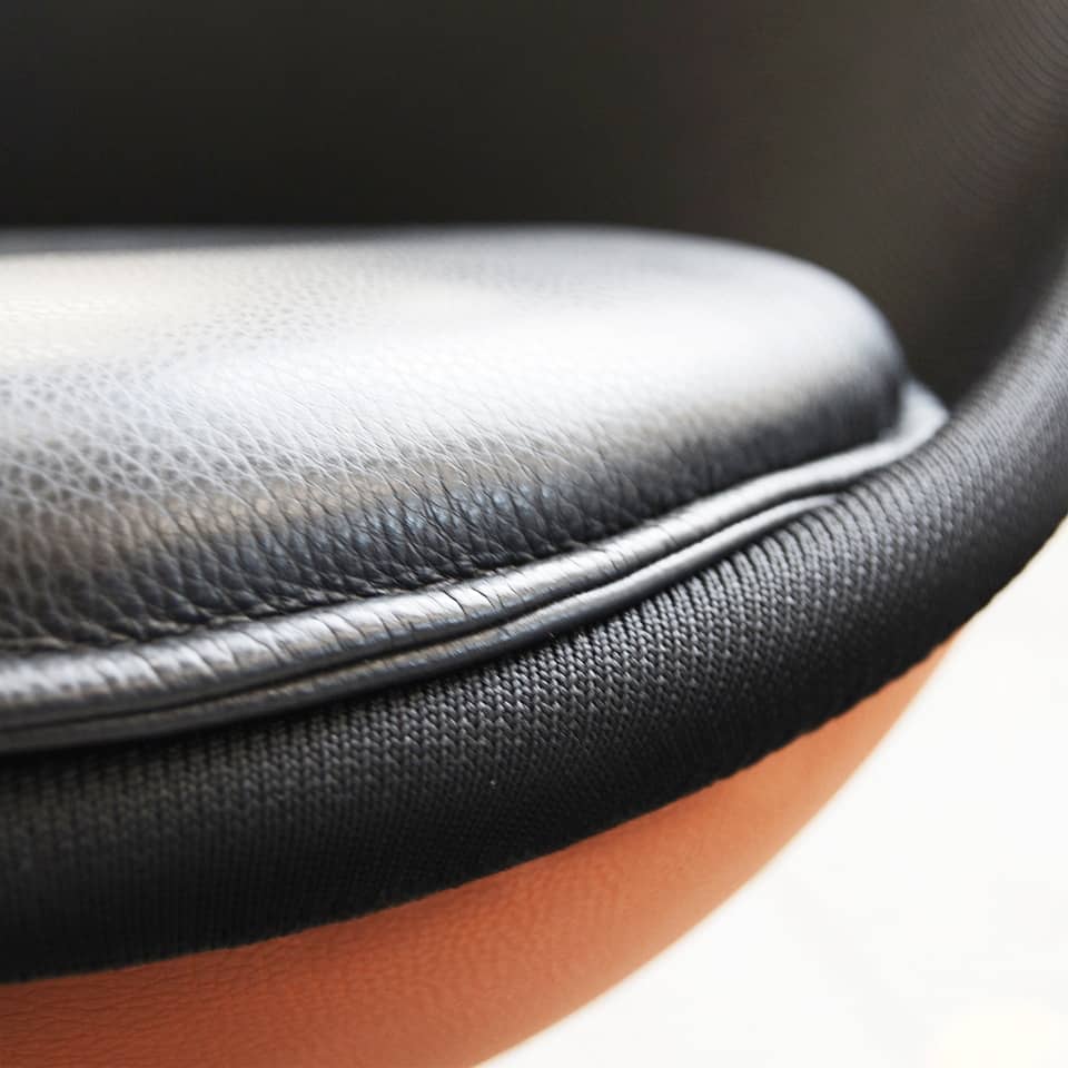 detail image of a lillus lento basketball chair bar chair with black leather seat cushion unique sports furniture ball chair lounge chair round chair globe chair made in germany for retail design gastronomy