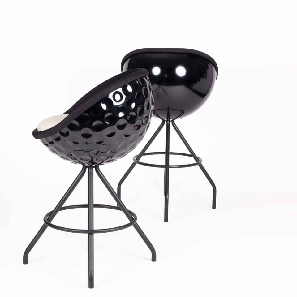 image of two bar stools golf design golf chairs black with dimples sports furniture made in germany by lento eagle