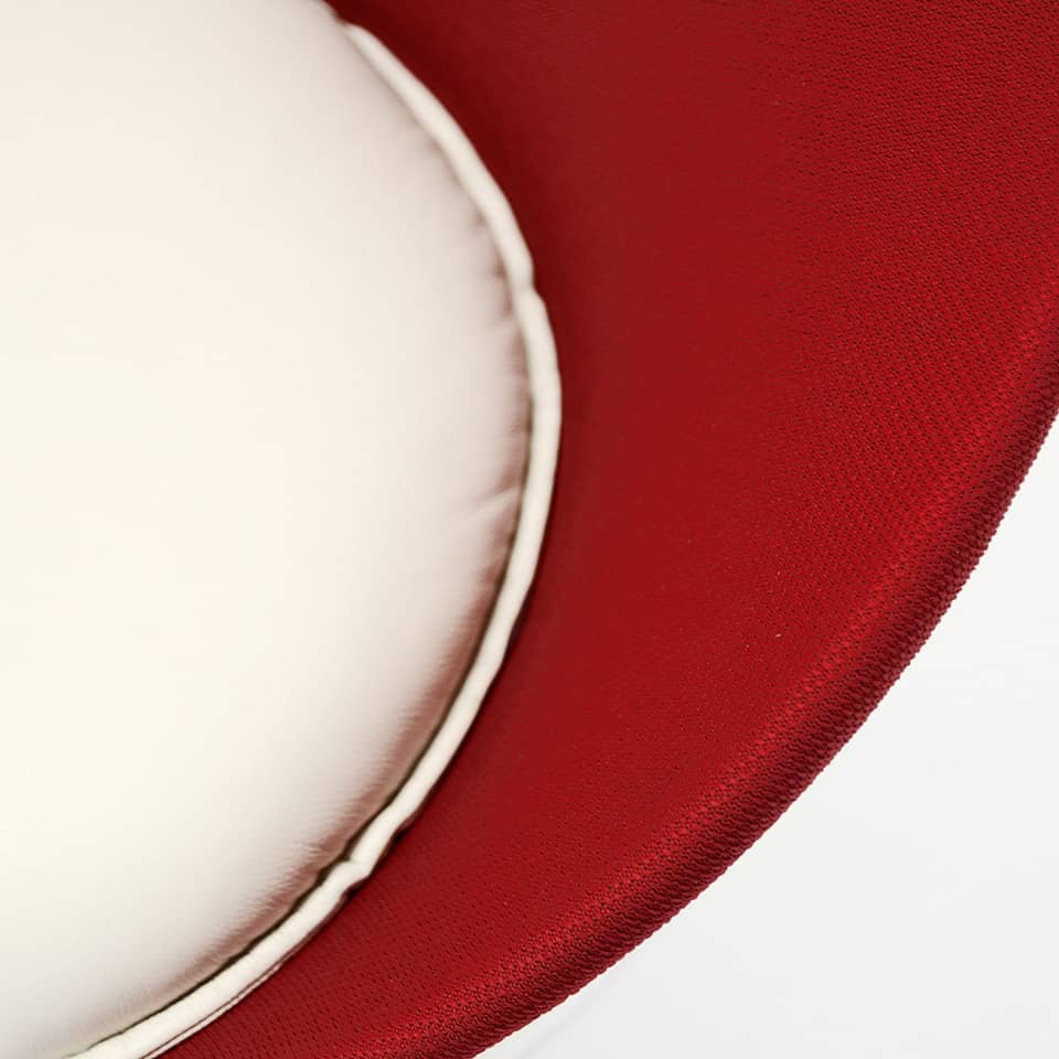 detail picture of a lounge chair cocktail stool in baseball homerun design red and white details exclusive sports furniture with seat cushion in white leather made in germany