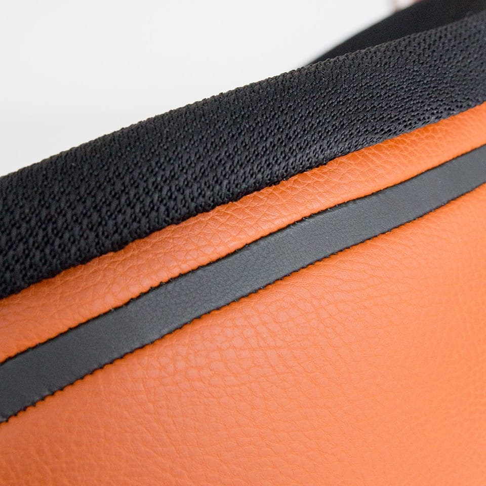 detail image of a bar stool lillus by lento in basketball design unique lounge chair ball chair round chair in black orange colour premium sports furniture for hotel area gastronomy sports industry