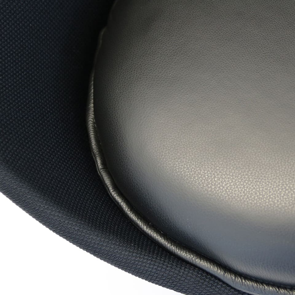 detail picture of a lounge chair dinner chair lillus by lento in basketball design ball chair round chair globe chair with seat cushion in black leather highend sports furniture for gastronomy hotel areas sports industry made in germany