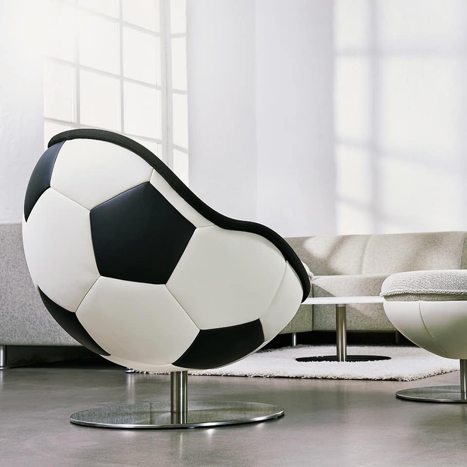 image of a lillus lento lounge chair football seat round chair in football design hattrick for hotel interior, gastronomy or sports management